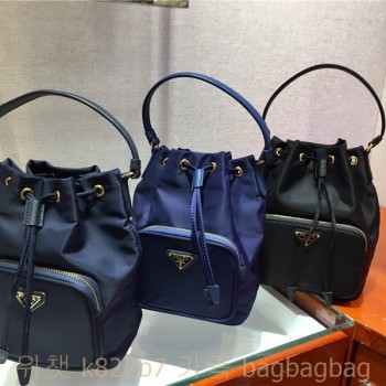 프라다 PRADA 나일론 버킷백 미니 1BH1864 
